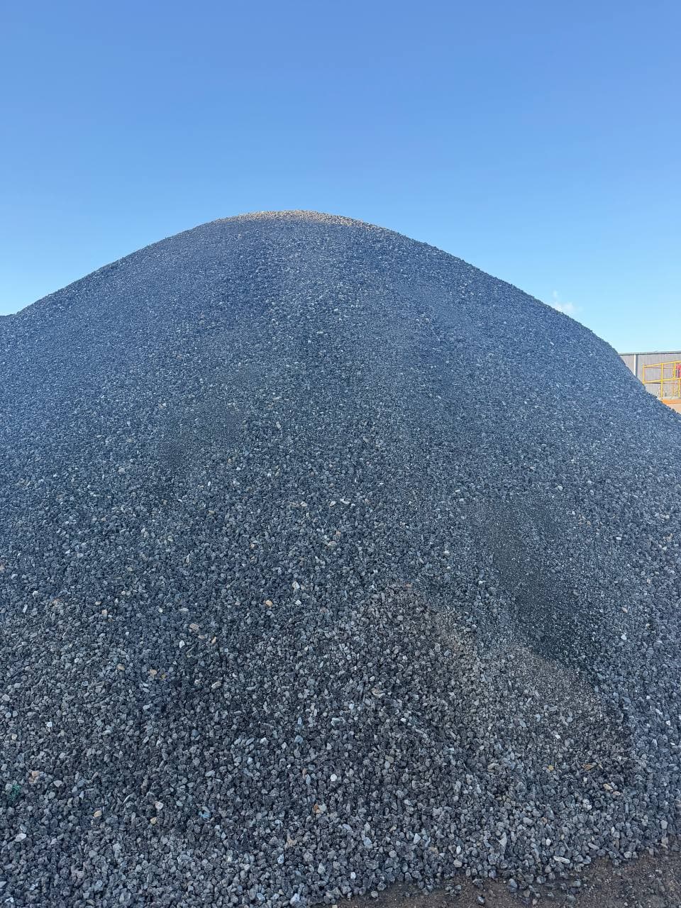 Stockpile of black road profiling at Recycling King