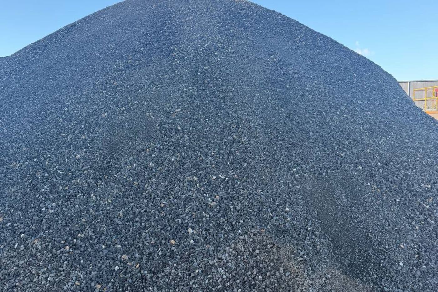 Stockpile of black road profiling at Recycling King
