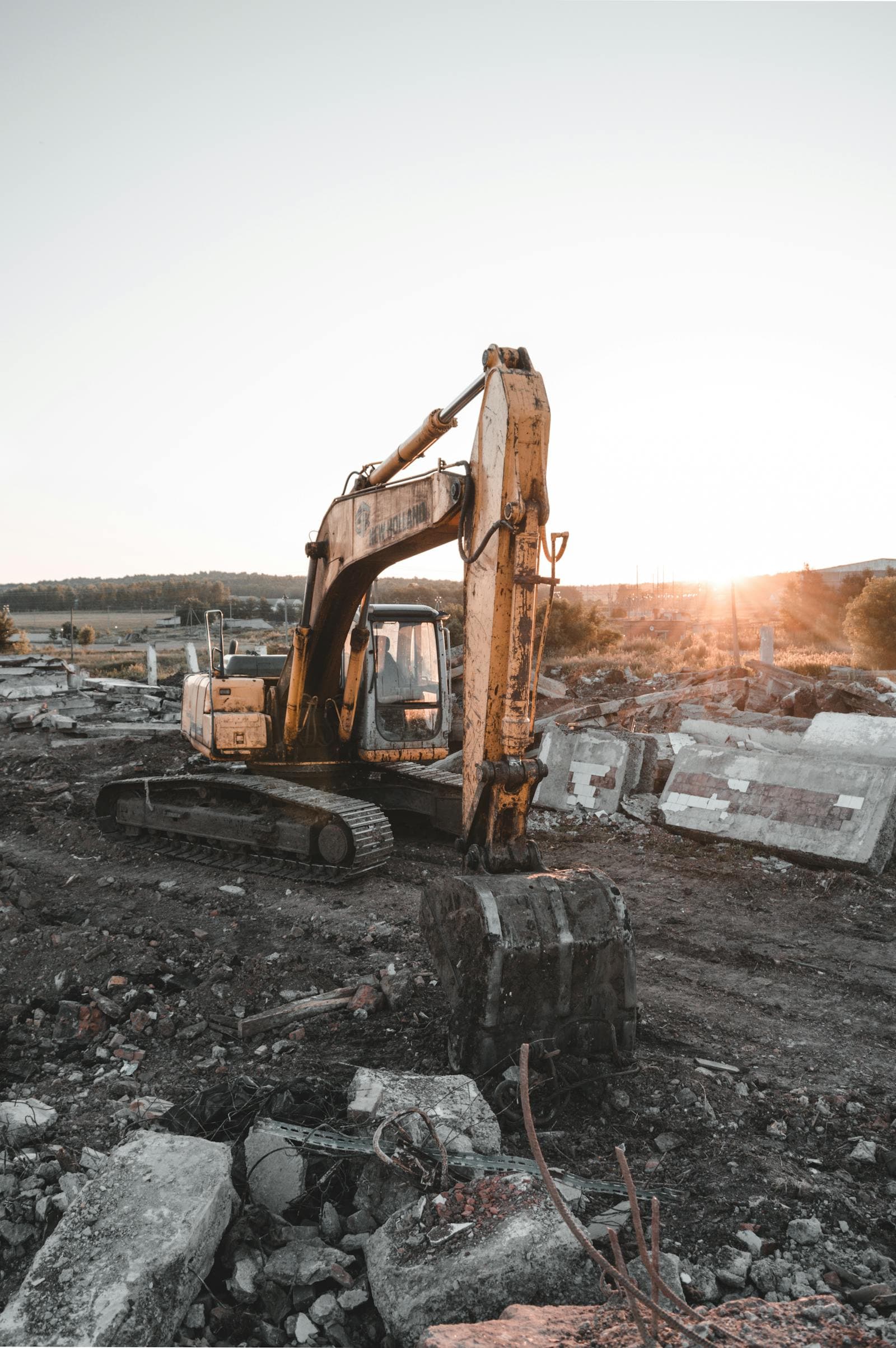 Excavator working a demolition site